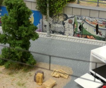 Plastico ferroviario "Una moderna cittadina tedesca" murales