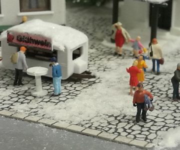 Plastico ferroviario "Diorama innevato da libreria" gente